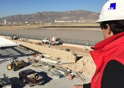 ECM staff member overlooking an airport construction site